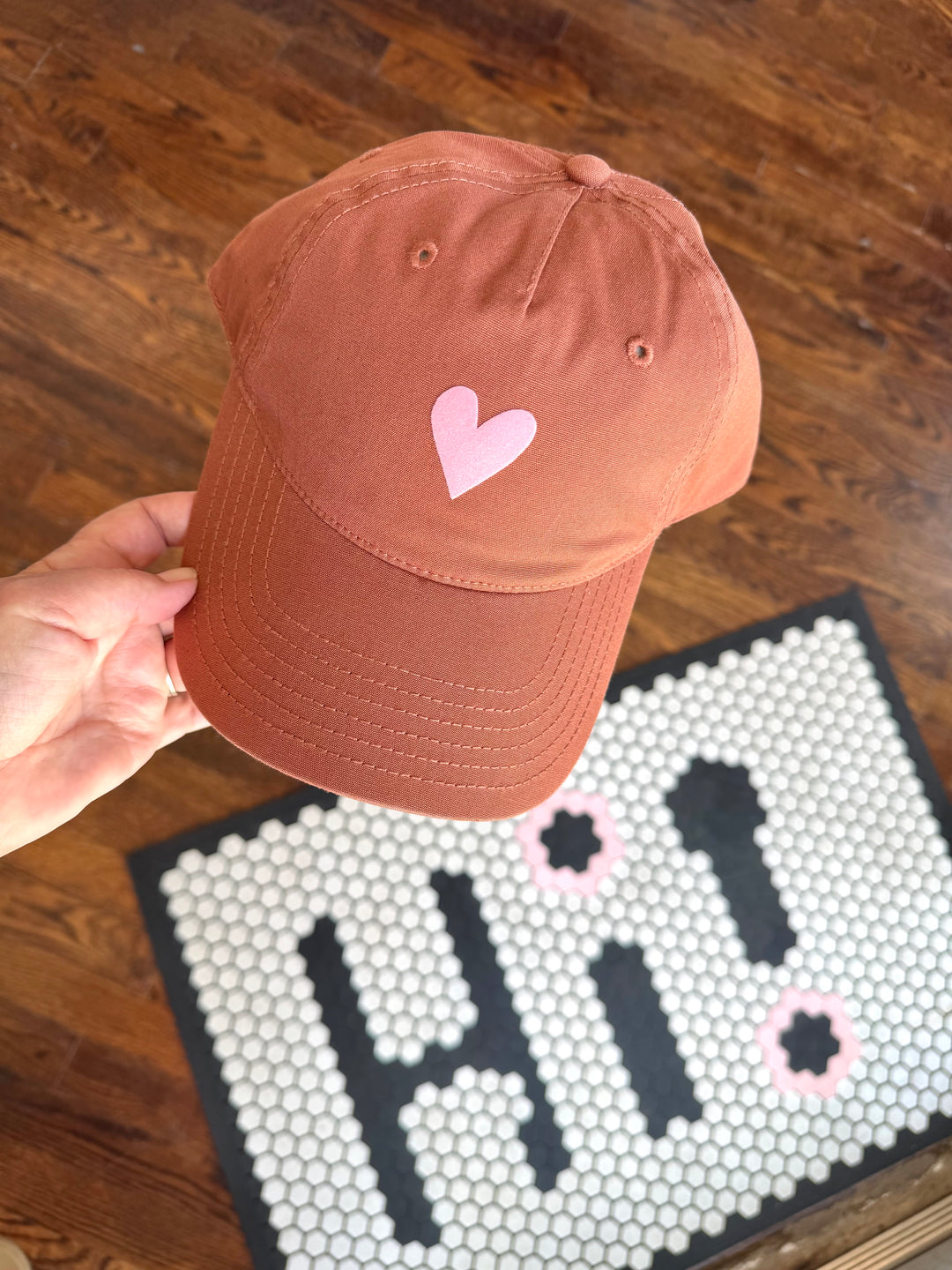 Terracotta women’s adjustable baseball-style hat with pink velvet heart on front panel
