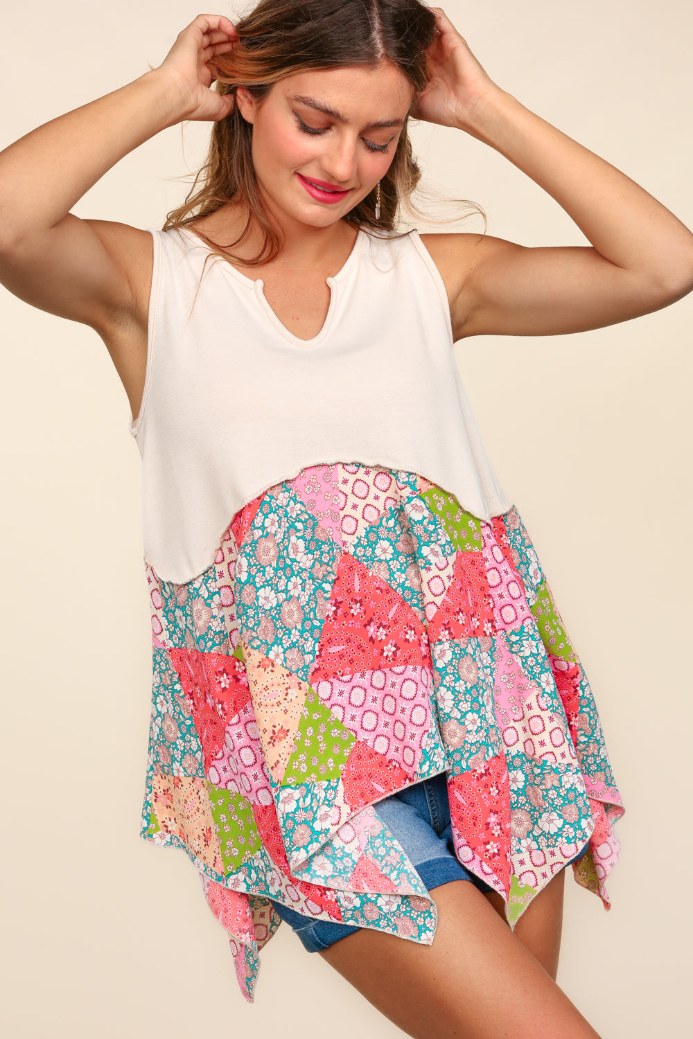 Cara Sleeveless Peplum Top
