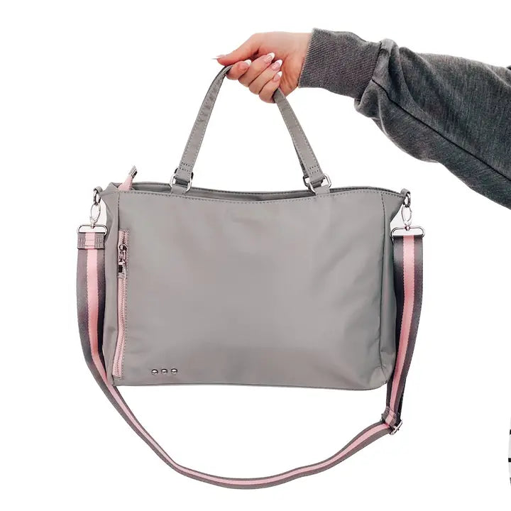 Gray Nina Nylon Tote Bag with exterior zipper pocket, adjustable strap, and interior compartments for everyday convenience.