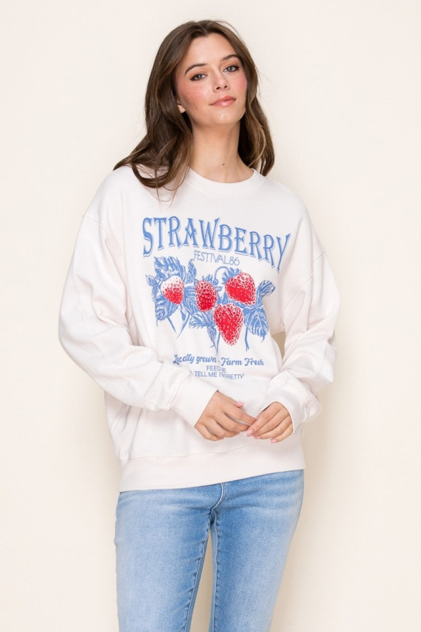 Strawberry Festival Graphic Sweatshirt with a vibrant strawberry print, relaxed fit, and soft fabric for a trendy and playful look.