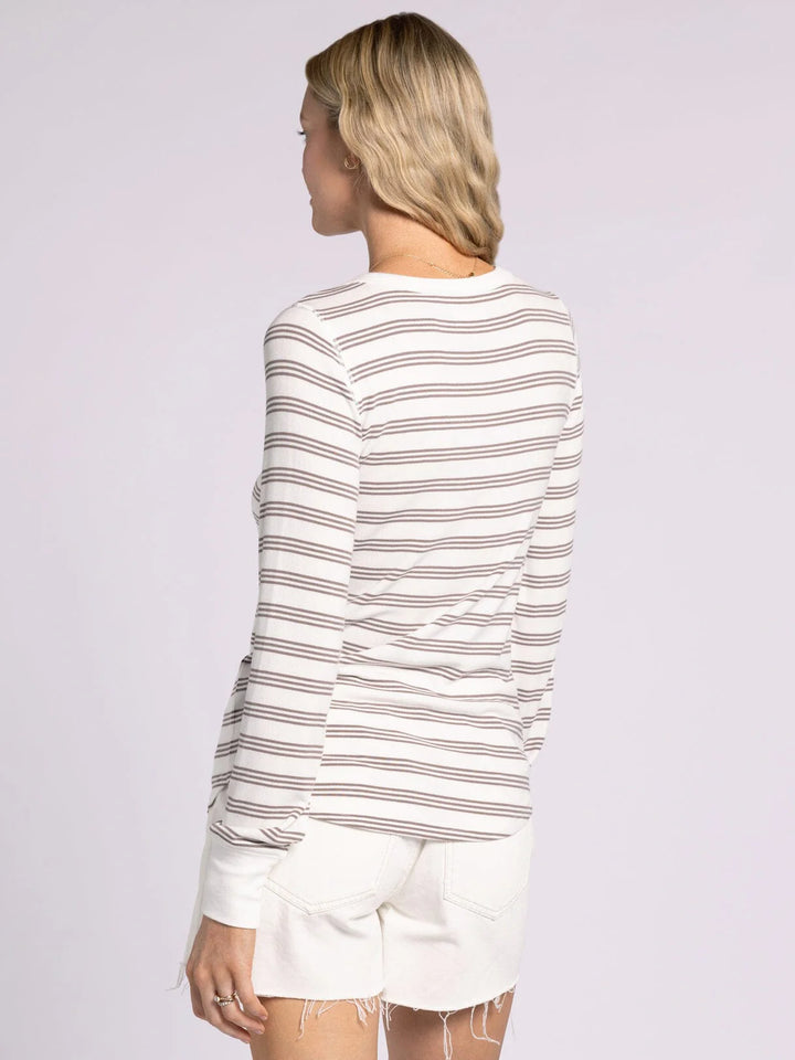 Back view of Thread & Supply Striped Stacy Top in white and taupe. Fine-ribbed, buttery soft long sleeve with a relaxed fit, crew neck, and cuffs. Lightweight and versatile for layering or everyday wear.