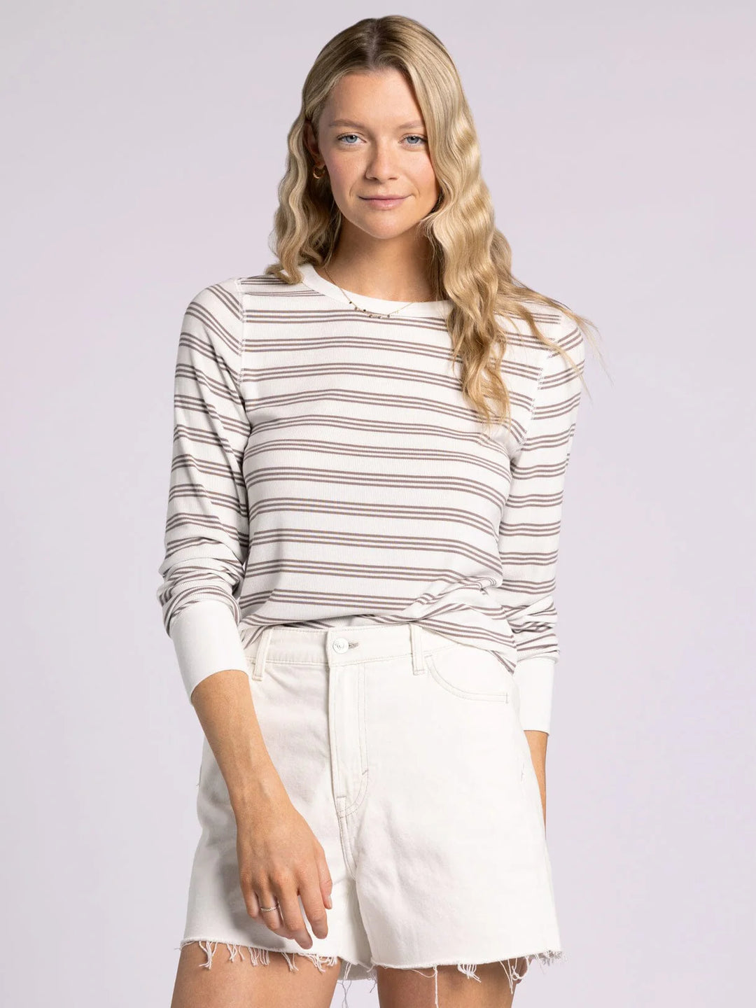 Thread & Supply Striped Stacy Top in white and taupe. Fine-ribbed, buttery soft long sleeve with a relaxed fit, crew neck, and cuffs. Lightweight and versatile for layering or everyday wear.