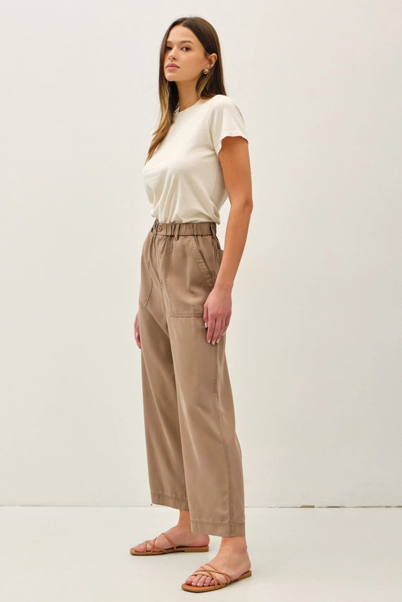 Woman wearing Amorie Wide Leg Tencel Pant with Elastic Waist, styled with a summer tank and sandals.